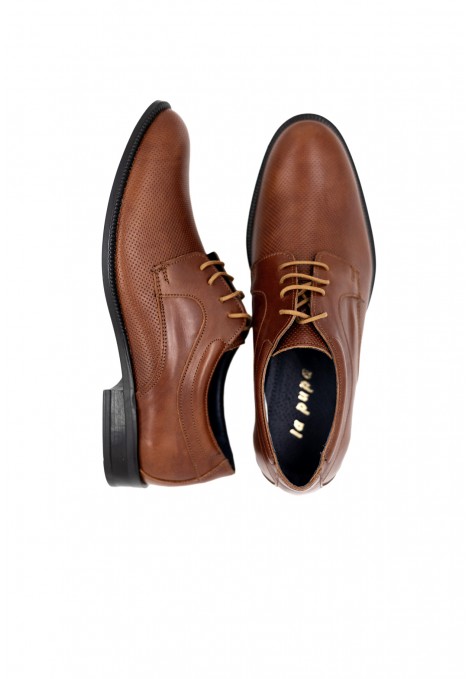 Man’s cognac shoes