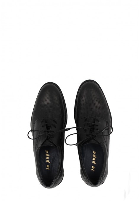 Man’s  black shoes.