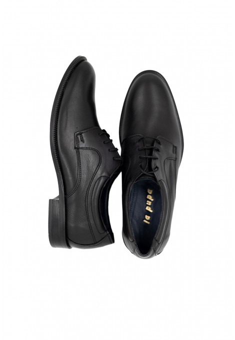 Man’s black shoes