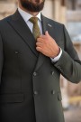 Man's dark green double-breasted suit