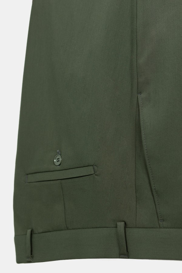 Man's dark green double-breasted suit